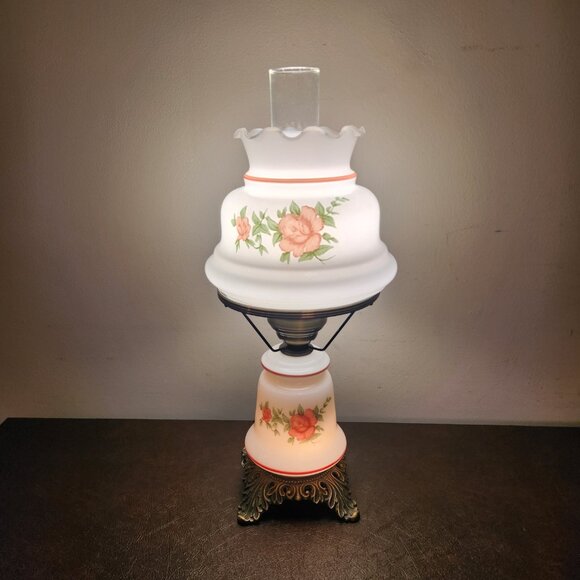 Vintage antique parlor lamp features a hand-painted floral rose design on glass
